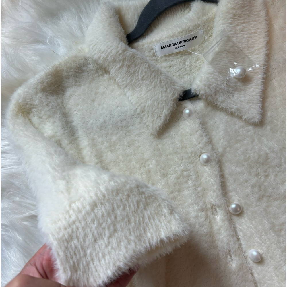 AMANDA UPRICHARD White fuzzy pearl button up top